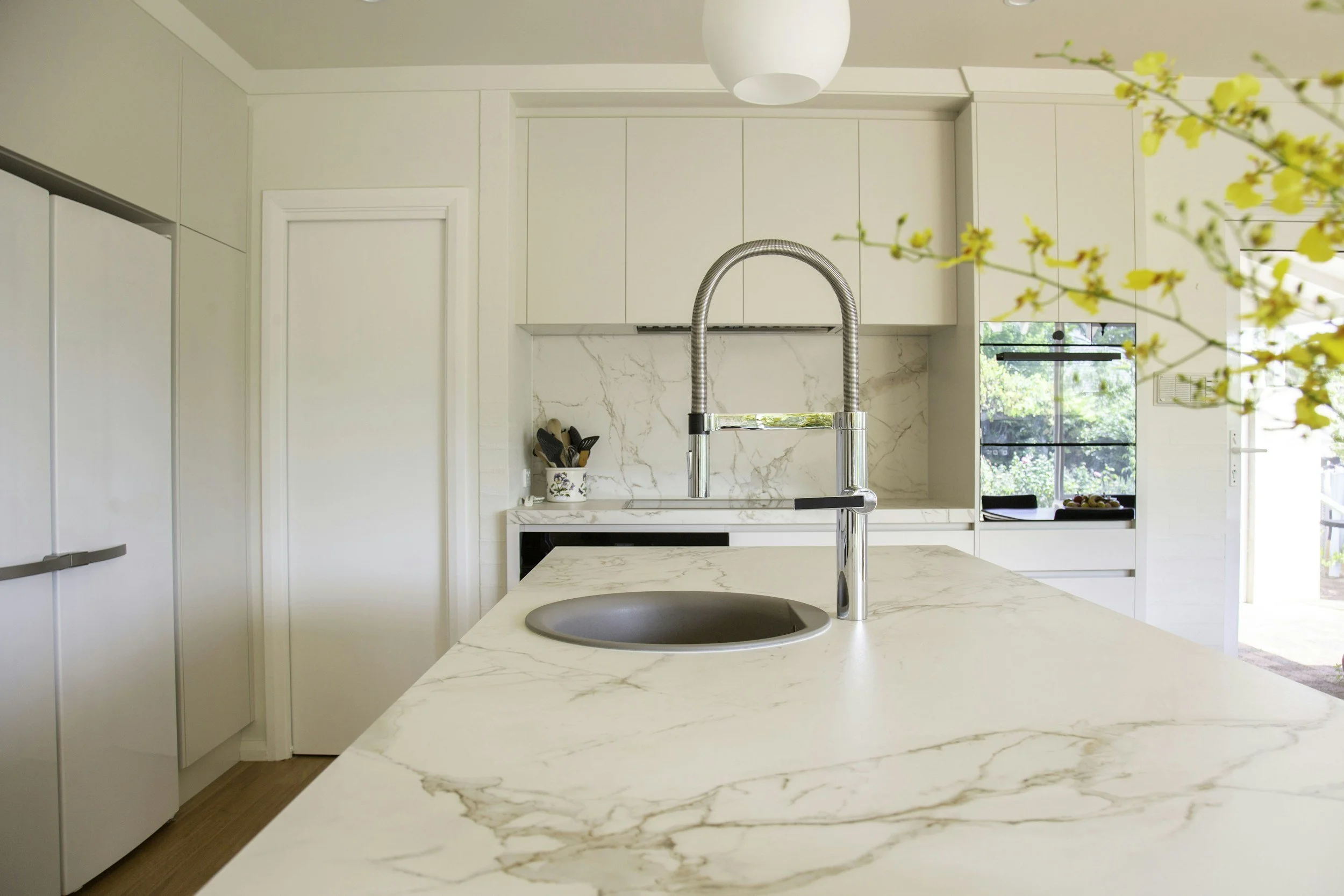 Bright, clean kitchen maintained by OP LUX